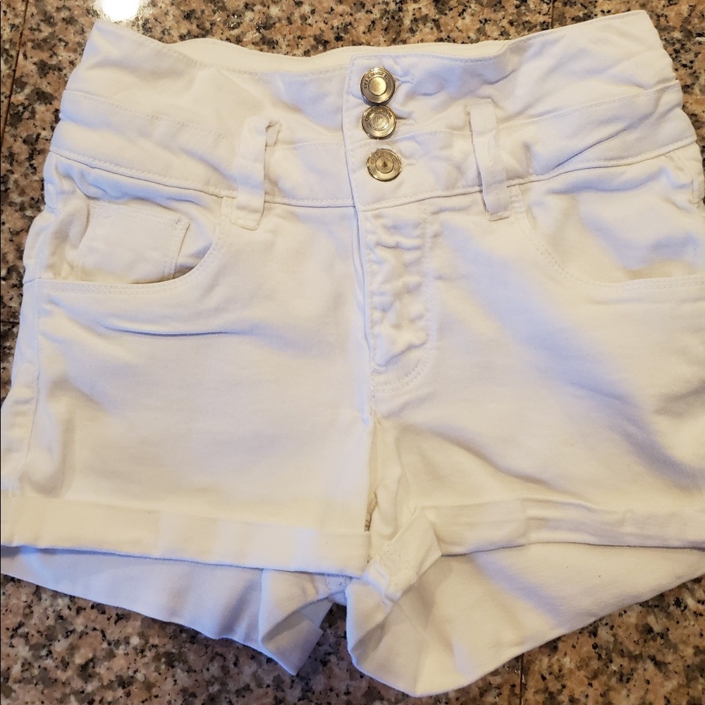 Juniors size 5 high waist stretch white shorts.